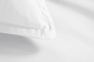 A close up of a bamboo pillow case and bamboo pillow sham.